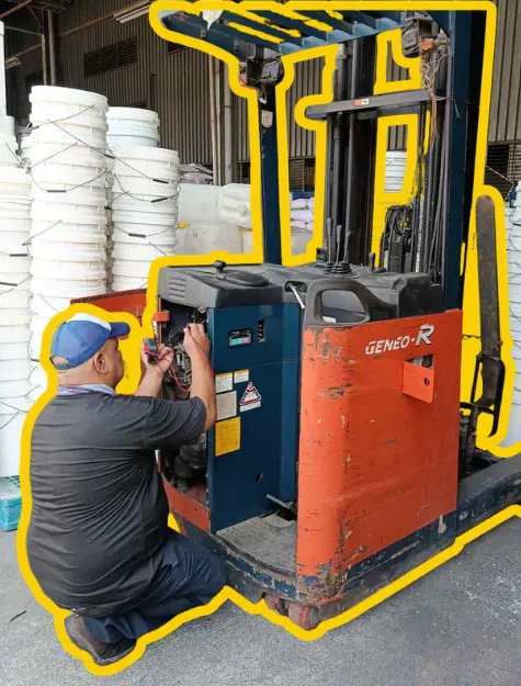 Happy Hoisters technician fixing a reach truck